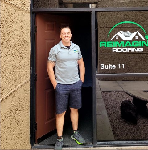 Kody in the doorway of his original office, Suite 11